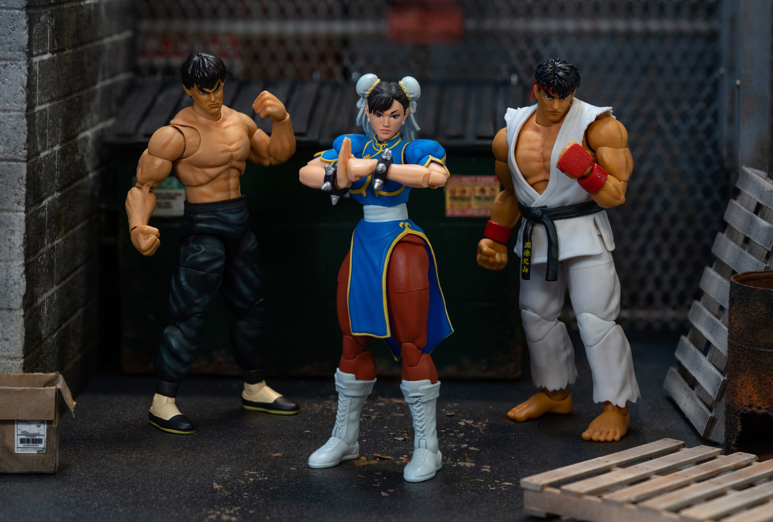 ActionFigures-StreetFighter-6in-W1-ChunLi-34216-Social-11 Jada Toys team standing with life size replica of Roy Focker's 2020 Toyota Supra from Robotech